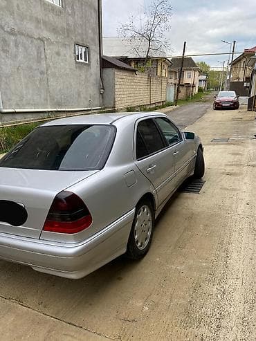 07 sekilleri cekmek: Mercedes-Benz C-Sinif sedan (W202), gümüşü rəng. - Kuzov: 4 qapılı — 3