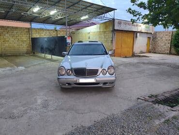 w210 kompressor: Mercedes-Benz E 220: 2.2 l | 2002 il Sedan — 1
