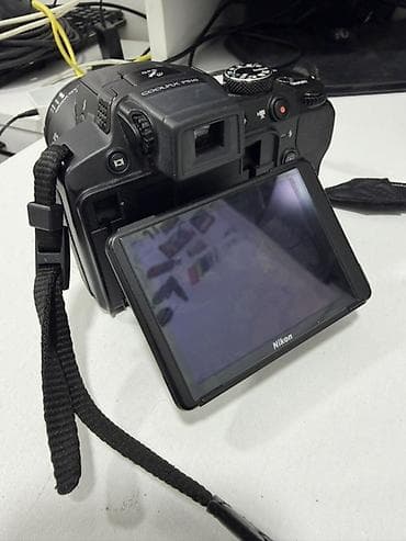 nikon d: Nikon COOLPIX P510 fotoaparat. Model üzərində “Nikon COOLPIX P510” — 1