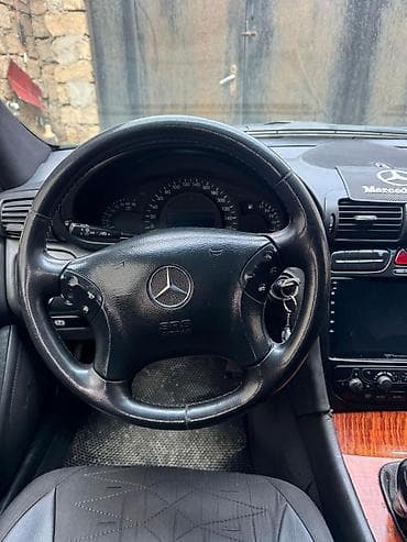 mini cooper kreditle: Mercedes-Benz 200-Series: 2 l | 2000 il Sedan — 3
