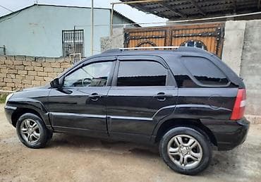 kia caren 2012: Kia Sportage – qara rəngli, kompakt SUV 15.500 2008ci il Texniki — 5