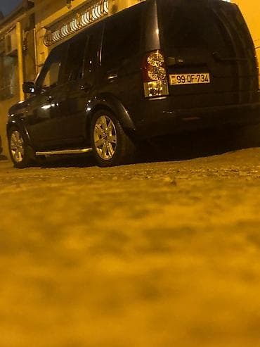 4 qapi niva: Land Rover Discovery 3 – tünd mavi rəng, tam ölçülü SUV. Əsas — 7