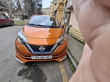 Nissan Note e-POWER, narıncı rəngli, şəhər üçün ideal hibrid (benzin