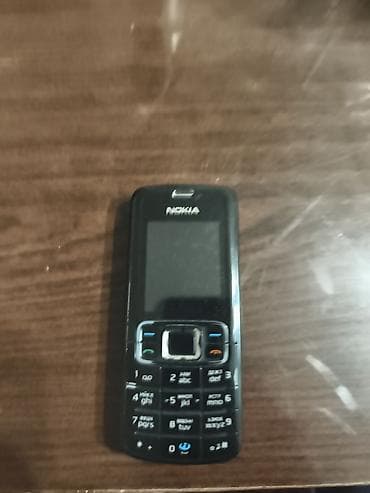 Nokia 130, 2 ГБ, цвет - Черный, Кнопочный — 1