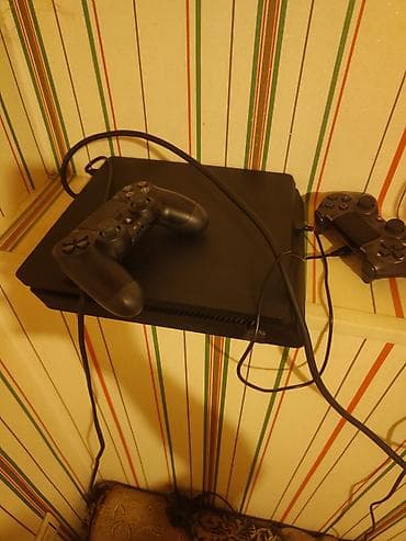playsta: PlayStation 4 Slim oyun konsolu: - Model: PS4 Slim (Sony PlayStation — 2