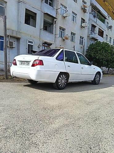vito disk: Model: Daewoo Nexia (sedan), ağ rəng Kuzov: 4 qapı, arxa spoyler — 3