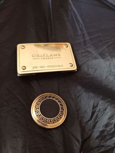 qizil qolbagilar: Oriflame brendinə məxsus yığcam guzgu kimi parlaq loqo, sumkaya — 6