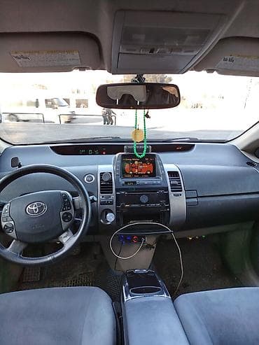 ford ehtiyat hisseleri: Toyota Prius (2-ci nəsil) hibrid hetçbek - Rəng: mavi - Salon: boz — 1