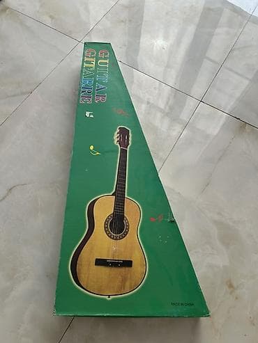 qitar: Klassik akustik gitara – 6 simli, tam ölçülü korpus. Günbatımı — 2