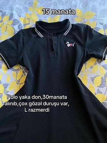 Polo yaxalı qara don. Boyun və qollarında ikizolaqlı ağ zolaqlar, ön at lalafo.az Polo yaxalı qara don. Boyun və qollarında ikizolaqlı ağ zolaqlar, ön