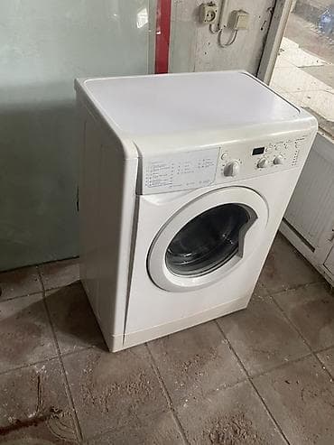 Öndən yükləməli paltaryuyan maşın, ağ rəngdə. İdarəetmə paneli at lalafo.az Öndən yükləməli paltaryuyan maşın, ağ rəngdə. İdarəetmə paneli