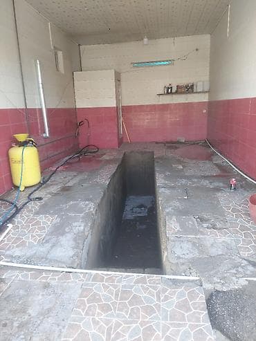 Продается гараж: Moyka arendaya verilr.daimi islek yerdi.yol kenaridi.qiymet 900.azn — 2