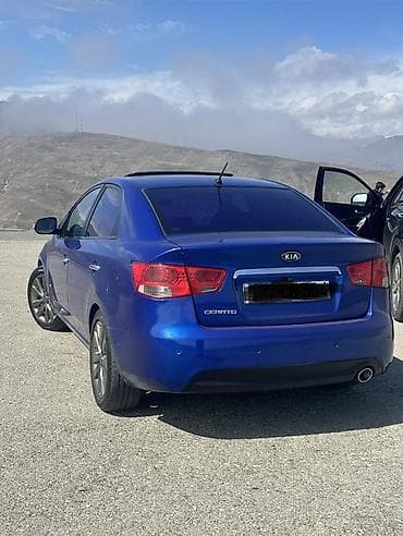 park maşını: Kia Cerato: 2 l | 2009 il Sedan — 5