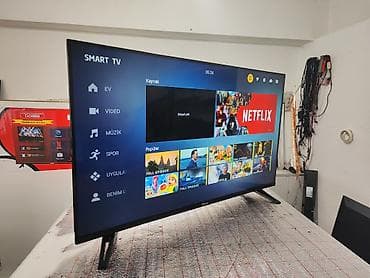 mini kondisener: TOKLA Smart TV – geniş funksiyalı televizor - Ekran: Təxminən 40–43 — 5