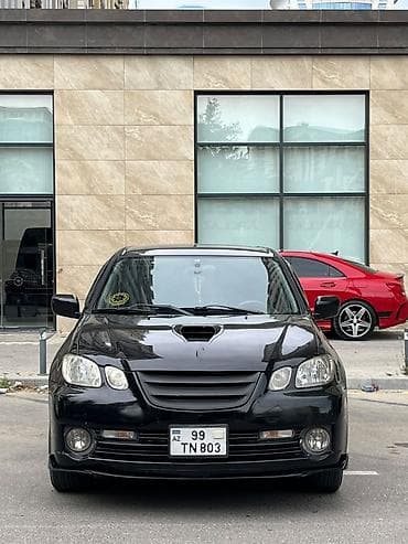 07 disk: Mitsubishi Airtrek (Black) – şəhər və uzun yol üçün çox yönlü kompakt — 4