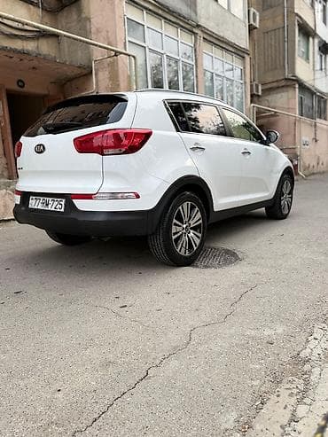 tesla disk: Kia Sportage, ağ rəng, kompakt krossover. Güclü və qənaətcil — 4