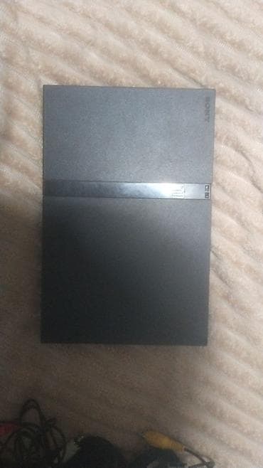 Məhsul: Sony PlayStation 2 Slim (PS2 Slim) oyun konsolu Təsvir: -