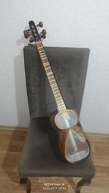 Tarın səsi aydın və gözəldir Çanağı oyma tut ağacıdır qolu qoz