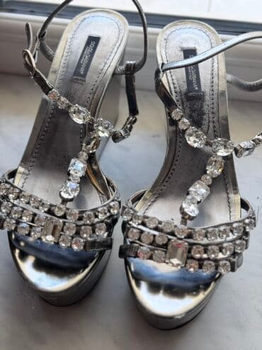 qadın donlari: Dolce & Gabbana brendinə məxsus qadın platforma səndəlləri. Gümüşü — 1