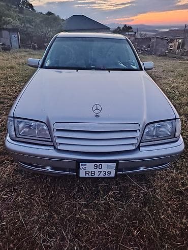prius qapi: Model: Mercedes-Benz C-sinfi sedan (W202) Kuzov: 4 qapı, gümüşü rəng — 1