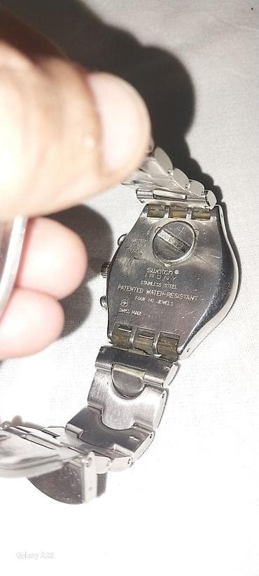 swatch: Swhec tam orginal saatir 1997 buraxilshidir super saatdir qolda super — 3