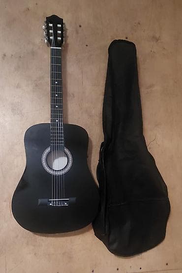 gitara simi: Qara rəngli klassik akustik gitara seti Məlumatlar aşağıda qeyd — 2