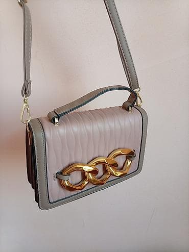 sumkalar: MAYA DƏYƏRİNƏ Qadın çantaları – müxtəlif modellər 1) Çoxfunksiyalı — 9