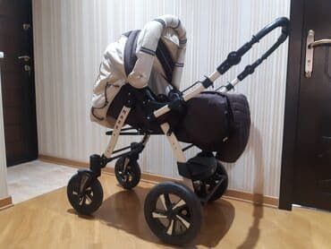 ekiz usaqlar: Çıxarıla bilən beşikli araba — 1