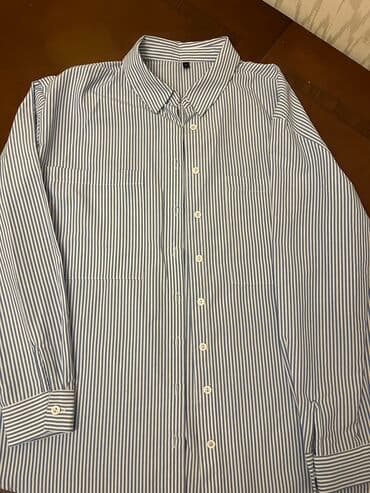 Cizgili mavi reng koynek 36 olcudur ancaq 38 ede geder