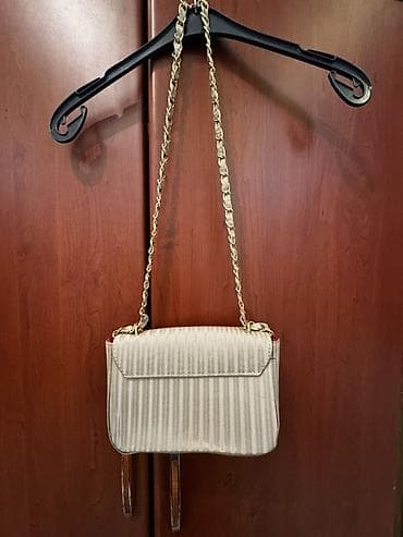 Велосипеды: - Qadın üçün 2 ədəd çanta dəsti 1) Qızılı rəngdə mini bel — 6