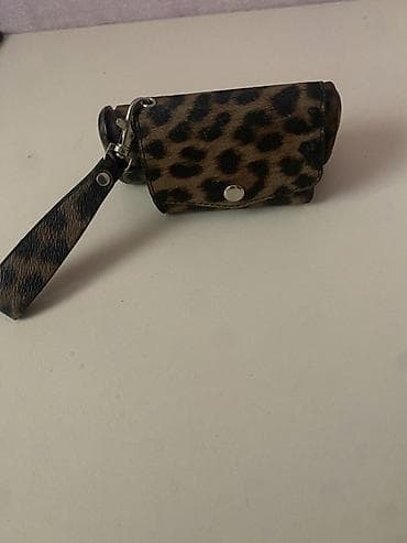 Красота и здоровье: IQOS ve üzerinde leopar naxışlı, kompakt çantaya bənzər qalın korpuslu — 1