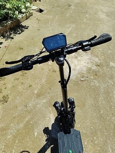 Elektrik skuter – off-road tipli, iri dişli təkərlər və güclü asqı — 4