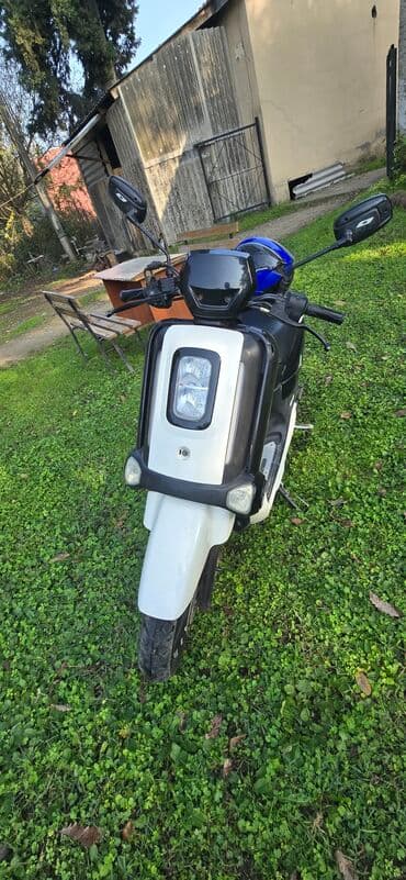 hibrit masinlar turbo az: Skuter FY-ET - Rəng: Qara-ağ iki­rəng dizayn - Gediş mövqeyi: Aşağı — 1