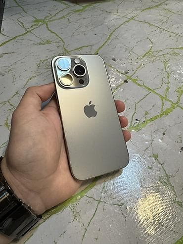 philips xenium 9@9h: IPhone 15 Pro, Natural Titanium, Face ID — 1