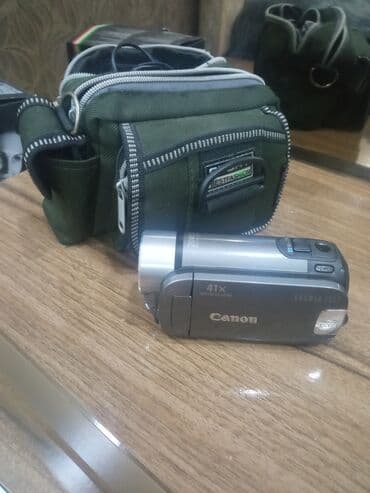 20 qepik kontur gondermek nar: Canon firmasinin hem kamera cekir, hem de foto çekir.tezedi.cantasi — 2