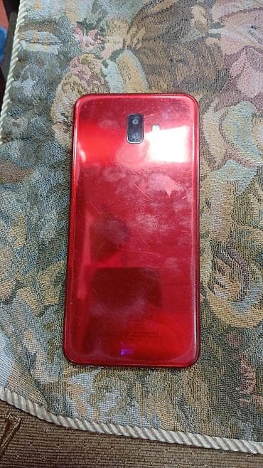 Qırmızı rəngdə smartfon BU GUNLUK 25 AZN ENDIRIM SABAH 35 OLACAQ -
