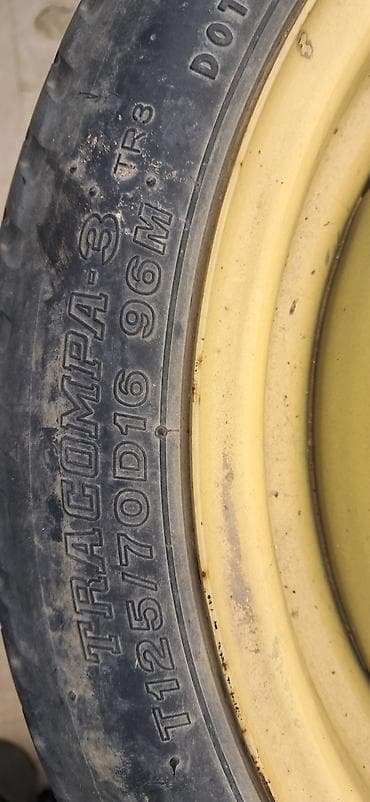 4 teker: Yüngül ehtiyat təkər (donqat) – polad disk ilə komplekt. - Rəng: sarı — 4