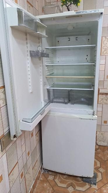 Məişət texnikası: Iki qapılı məişət soyuducusu - Üst qapı – soyutma bölməsi, alt qapı – — 2