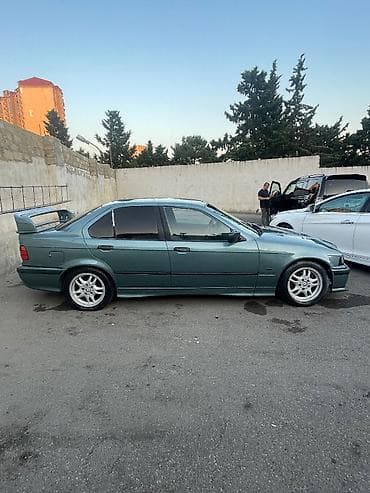 1994: BMW 3 series: 1.8 l | 1994 il Sedan — 6