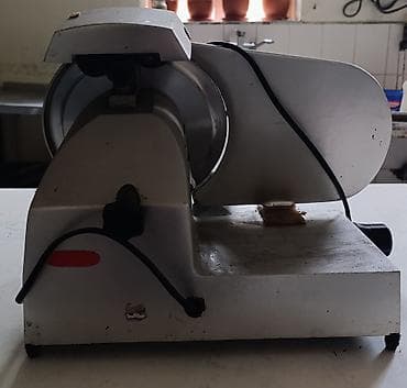 Металлоискатели: Sumqayit seherinde kolbasa doqrayan aparat satilir.islek — 2