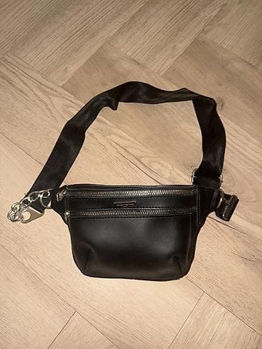 Qara bel/çiyin çantası (banan tipli) - Material: hamar süni dəri lalafo.az -da Qara bel/çiyin çantası (banan tipli) - Material: hamar süni dəri