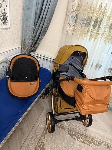 Çıxarıla bilən beşikli araba, Kidilo