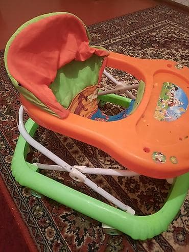 Uşaq dünyası: Uşaq gəzirtdisi (yürütəcə) - Rənglər: narıncı, yaşıl və ağ karkas — 1