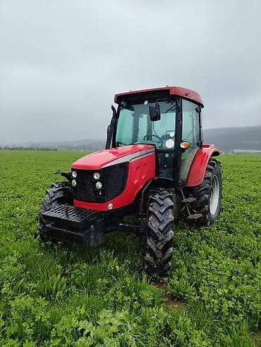 turbo az oka: Qırmızı kabinəli təkərli traktor Xüsusiyyətlər: - Tam qapalı — 6