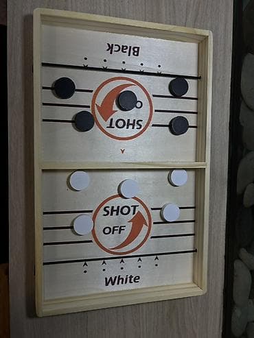 Taxta “Fast Sling Puck”/“Shot Off” masa futbol oyunu 30 azn-a alınıb