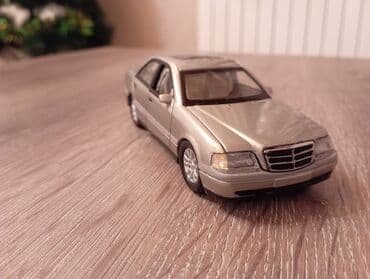 Книги и журналы: Mersedes c 220 modeli kitay istehsalı 1/36 ölcüdədəir .Bu modeli Öz — 10
