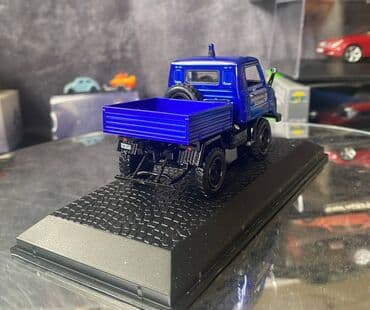 metbex tavan modelleri: Коллекционная модель Mercedes-Benz Unimog U411 Technical Relief blue — 14