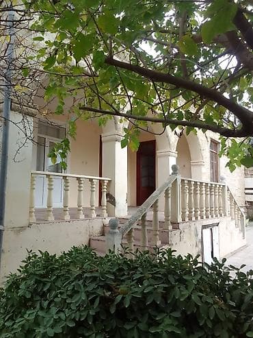 Satılır: həyətli ev - Memarlıq: daş materiallı, tağlı eyvan və