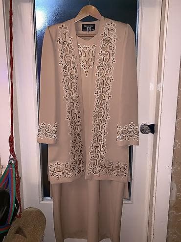 Şəxsi əşyalar: Paltar təzədir.Geyinilməyib.Ölçü: L — 2