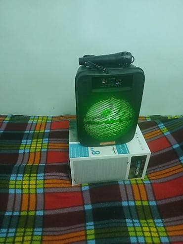 mp3 fm modulator: Portativ Bluetooth akustik sistemi + mikrofon - Kompakt korpus, ön — 1